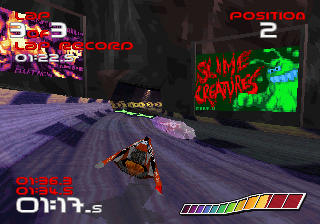 WipEout (SEGA Saturn) screenshot: Along with some real advertisements the game features other, not-so-real ones.