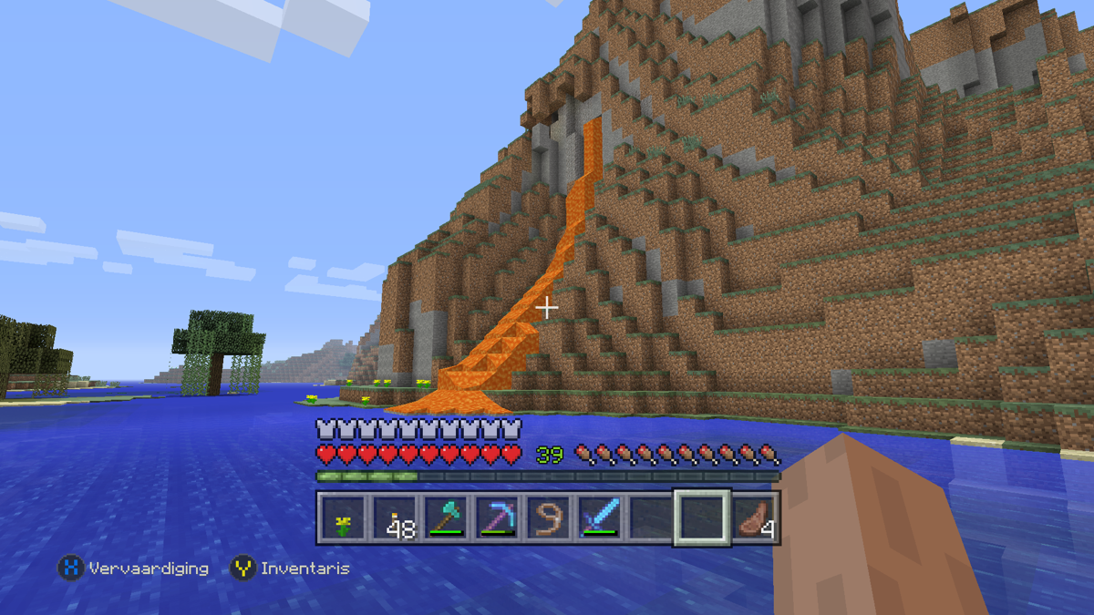 Minecraft: PlayStation 4 Edition (Xbox One) screenshot: Lava flowing from the side of the mountain