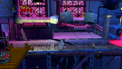 LEGO Batman: The Videogame (PSP) screenshot: Robin's magnetic suit (left) and Batman's gliding suit (center)