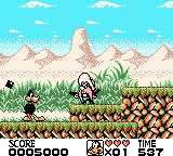 Looney Tunes (Game Boy Color) screenshot: "Why you crazy galoot, stand still so's I can blast ya!"