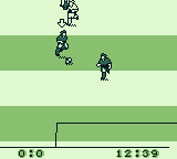 Elite Soccer (Game Boy) screenshot: He's running the ball down the field.