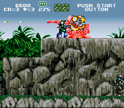 GunForce: Battle Fire Engulfed Terror Island (SNES) screenshot: Shooting at the cannon