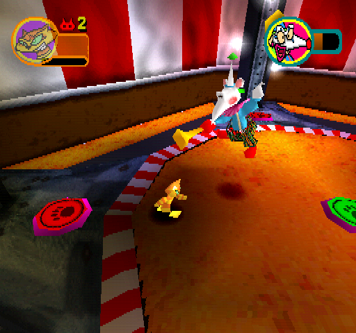 Rat Attack! (PlayStation) screenshot: Against Rat Clown. "Run over the middle switch to turn on an outer switch, then run to the outer switch to fire a dart at the clown."