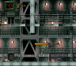 Alien³ (SNES) screenshot: Facehugged! Just ticks a bit off Ripley's life bar though.