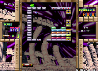 Arkanoid Returns (Arcade) screenshot: Keep hitting the blocks.