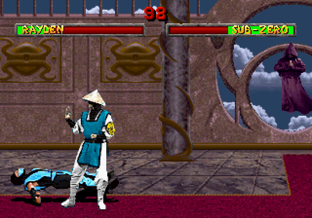 Mortal Kombat II (SEGA Saturn) screenshot: Sub-Zero bounces up from a Raiden slam