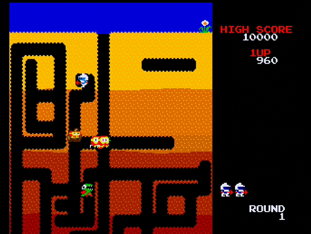 Namco Museum 64 (Dreamcast) screenshot: Dropping a rock on some enemies in Dig Dug