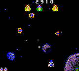 Galaga '88 (Game Gear) screenshot: After a while, the enemies gather at the end of the screen and come directly towards us