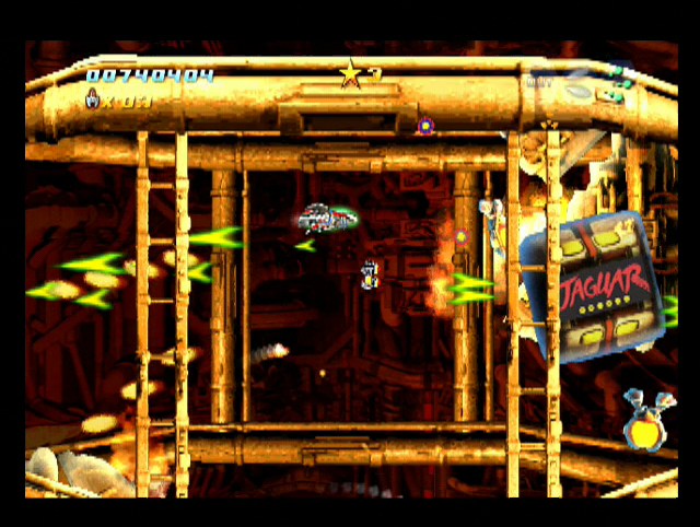 Sturmwind (Dreamcast) screenshot: Vertically-descending scrolling level with blocks falling on you; one of the blocks features a Jaguar logo