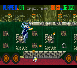 Edo no Kiba (SNES) screenshot: The first boss. Destroy the turrets on its trailer then take out the big one on the cabin.