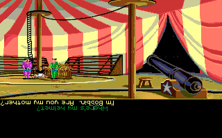 The Secret of Monkey Island (Amiga) screenshot: Guybrush just got shot out of the cannon.