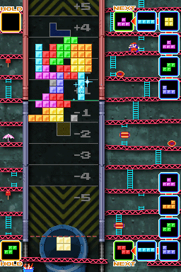 Tetris DS (Nintendo DS) screenshot: Push mode is another head to head offering in which you try to push a shared stack of blocks into your opponents zone by making doubles, triples and tetrises.