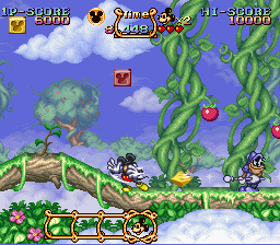 The Magical Quest Starring Mickey Mouse (SNES) screenshot: Mickey can grab and spin blocks to attack.