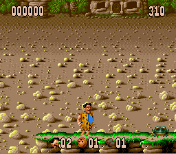 The Flintstones (SNES) screenshot: The frog will hurt you, too.