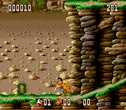 The Flintstones (SNES) screenshot: Another weapon is to throw rocks.