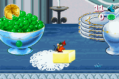 Disney's Cinderella: Magical Dreams (Game Boy Advance) screenshot: Sliding on a piece of butter