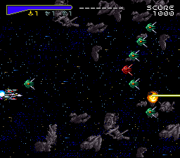 Chō Jikū Yōsai Macross: Scrambled Valkyrie (SNES) screenshot: The enemy in red carries a power-up