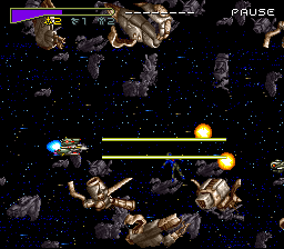 Chō Jikū Yōsai Macross: Scrambled Valkyrie (SNES) screenshot: Firing a powered up weapon