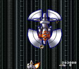 Acrobat Mission (SNES) screenshot: Boss #4 constantly fires off missiles and floods the screen with explosions.