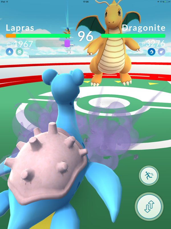 Pokémon GO (iPad) screenshot: Gym battle: Lapras versus Dragonite