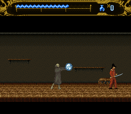 Mary Shelley's Frankenstein (SNES) screenshot: Frankenstein's monster can, at the cost of some of his health, form balls of negative energy at which to throw at his enemies, doing more damage to them.