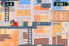 VeggieTales: LarryBoy and the Bad Apple (Game Boy Advance) screenshot: Red blocks can be moved and are used as platforms, since LarryBoy can't jump very high.