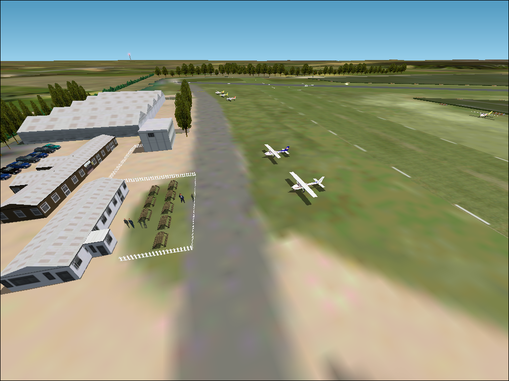 British Airports: South-East England (Windows) screenshot: Stapleford Aerodrome - parking area. Airfield opened in 1933, used in WW2 as 'RAF Stapleford Tawney'. Now privately owned.