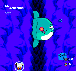 Star Parodier (TurboGrafx CD) screenshot: The boss of this level is a giant, candy-throwing fish