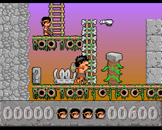Jurajski Sen (Amiga) screenshot: Caveman and a fly