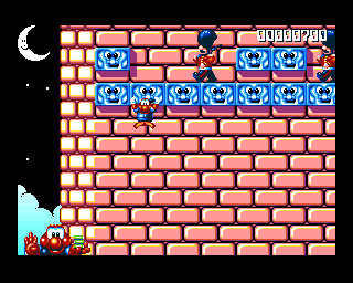 James Pond 2: Codename: RoboCod (Amiga) screenshot: Hanging onto a castle ledge.