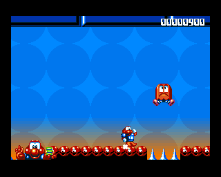 James Pond 2: Codename: RoboCod (Amiga) screenshot: Watch out for the baddie!