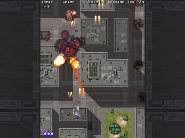 Wolflame (Windows) screenshot: Destroying tanks with the homing missile