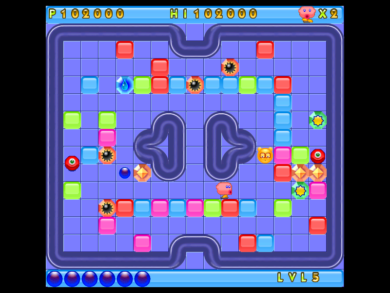 Blokketiblok (Windows) screenshot: A new monster is emerging out of a blue "egg" off to my left. The "eggs" in the lower left corner represent the number of monsters still left to kill.