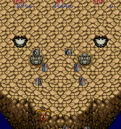 Legendary Wings (Arcade) screenshot: Ground defences.