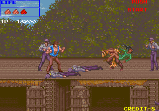 Growl (Arcade) screenshot: Woman in green suit has bad day