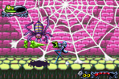 Tim Burton's The Nightmare Before Christmas: The Pumpkin King (Game Boy Advance) screenshot: Boss fight against a huge spider.