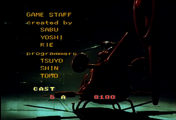 Cobra Command (Arcade) screenshot: Credits rolling while entering a high score