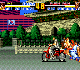 Fatal Fury Special (TurboGrafx CD) screenshot: This biker was just quietly driving through the streets of Seoul, unable to understand what was going on...