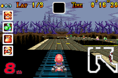 Mario Kart: Super Circuit (Game Boy Advance) screenshot: Mario using the little invisible bridge as a shortcut at Boo Lake.