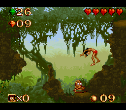 Disney's The Jungle Book (SNES) screenshot: These snakes will spring you up high.