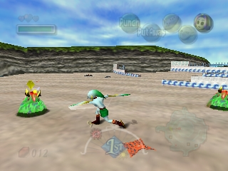The Legend of Zelda: Majora's Mask (Nintendo 64) screenshot: Ballet? No, sir. This is Zora Link gracefully dispatching of some nasties in this sandy area