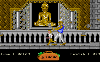 In 80 Days Around the World (Amiga) screenshot: A nasty boss by a statue. My life and time are almost up.
