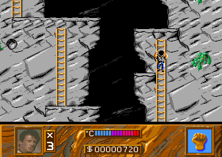 Cliffhanger (Amiga) screenshot: Rocks fall in the vertical sections. If one hits you, you'll be knocked off your ladder.