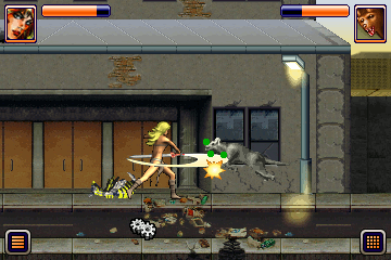 Axa (J2ME) screenshot: AXA defending herself against a feisty hound.