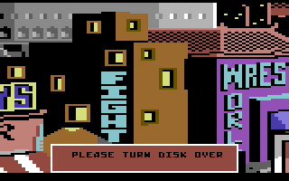 Sgt Slaughter's Mat Wars (Commodore 64) screenshot: Turn the disk over to load the fight