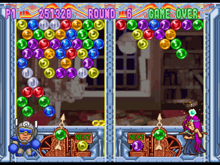 Bust-A-Move 3 (PlayStation) screenshot: Player vs. Luna