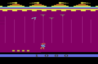 Dishaster (Atari 2600) screenshot: I've got four dishes but the one to the left is wobbling.
