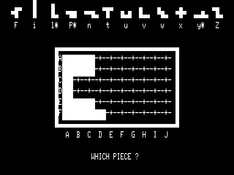 Pentominoes (TRS-80) screenshot: The board with some pentominoes placed