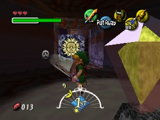 The Legend of Zelda: Majora's Mask (Nintendo 64) screenshot: One of the game's few, yet large and intricate dungeons - an old castle. Mysterious symbols, ancient doors... oh my