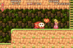 Super Mario Advance (Game Boy Advance) screenshot: Throw the big Shy Guy and he gives you a heart